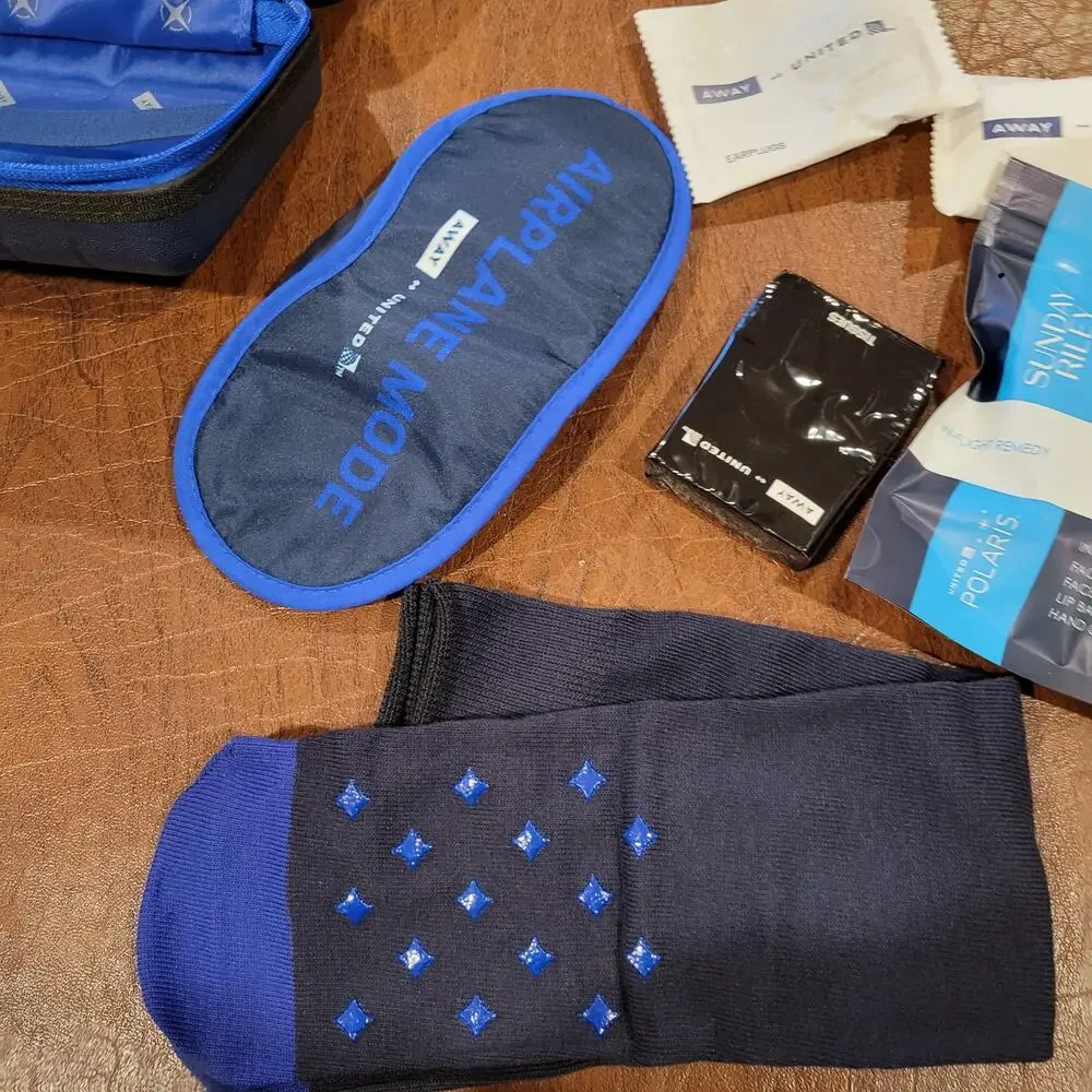 New AWAY Travel The Mini Suitcase Toiletry Case United Polaris Amenity Kit Pouch